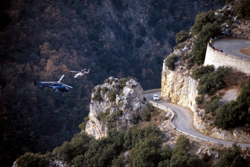 A Skoda WRC is tracked by helicopters during the 2002 Monte Carlo Rally