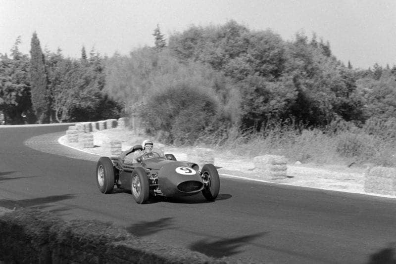 Carroll Shelby in an Aston Martin DBR4 250 during the 1959 F1 Portuguese Grand Prix