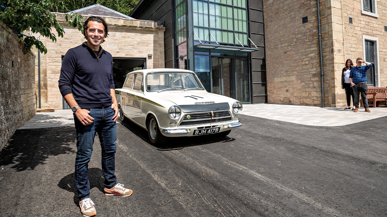 Dario Franchitti with Lotus Cortina outside Jim Clark Museum