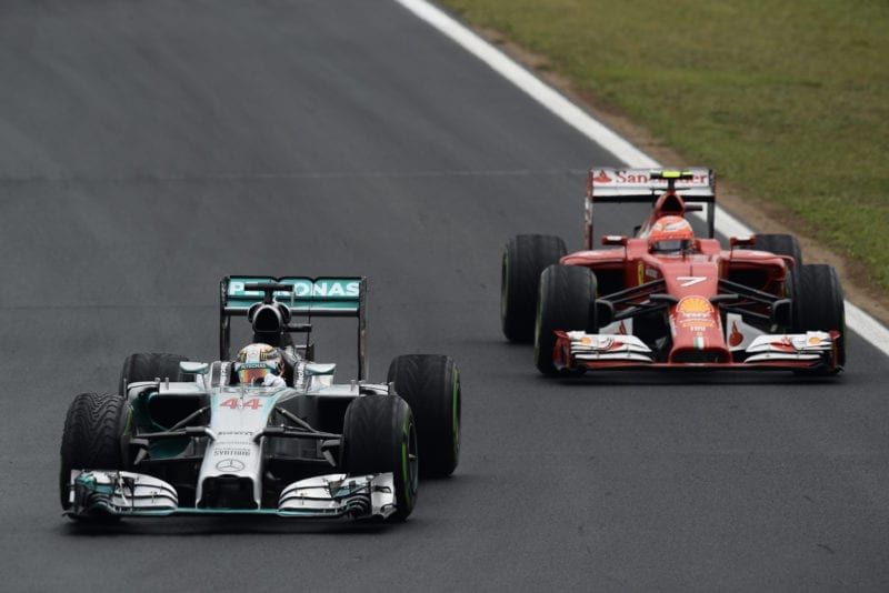 Lewis Hamilton ahead of Kimi Raikkonen's Ferrari in the 2014 F1 season