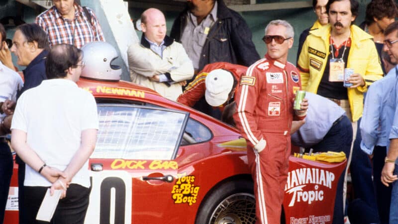 Paul Newman stands next to Porsche 935 at 1979 Le Mans 24 Hours