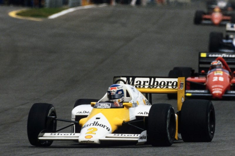 Keke Rosberg, McLaren MP4-2C TAG, leads Stefan Johansson, Ferrari F1/86.