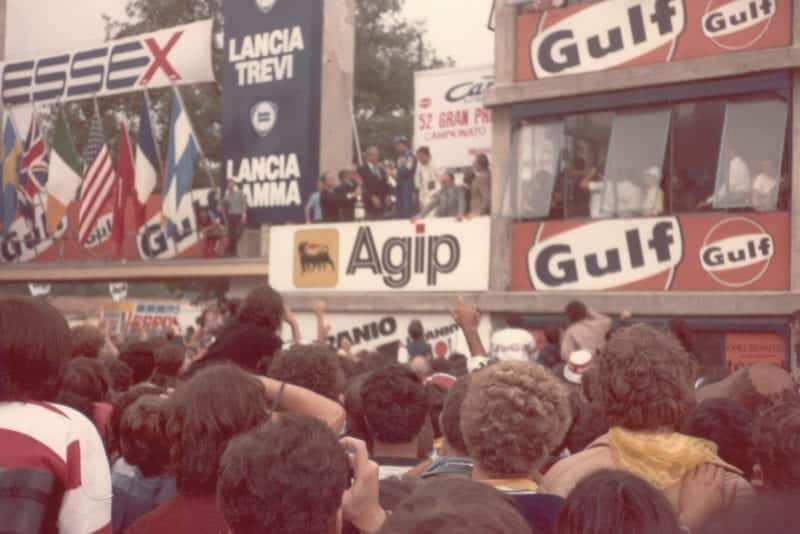 Alain Prost on the podium at the 1981 Italian GP