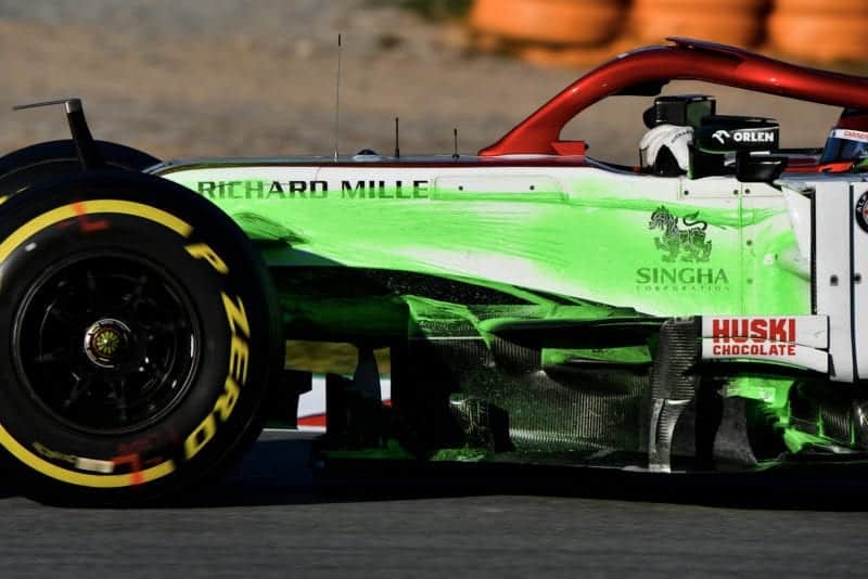 Alfa Romeo with flow-viz paint streaked down the side in 2020 f1 preseason testing