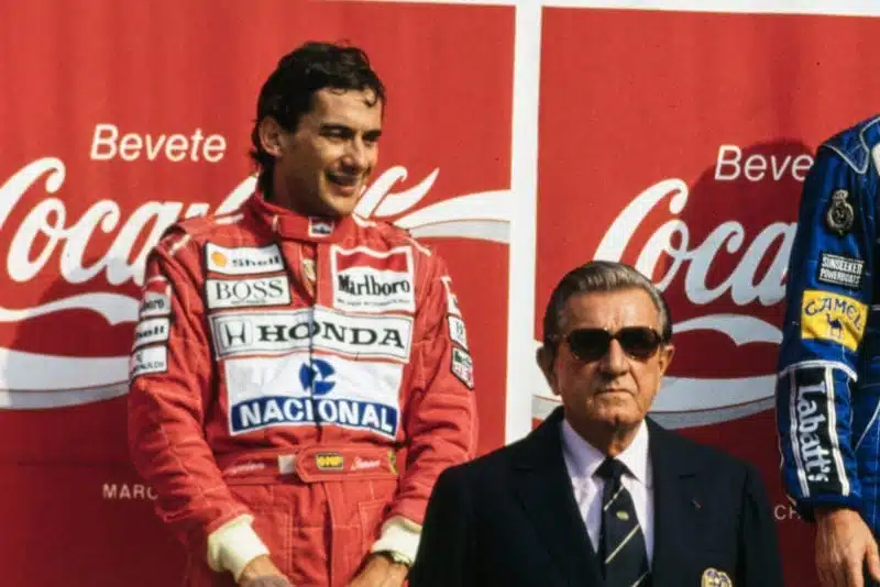 Ayrton Senna on the podium next to Jean Marie Balestre at the 1991 Italian Grand Prix