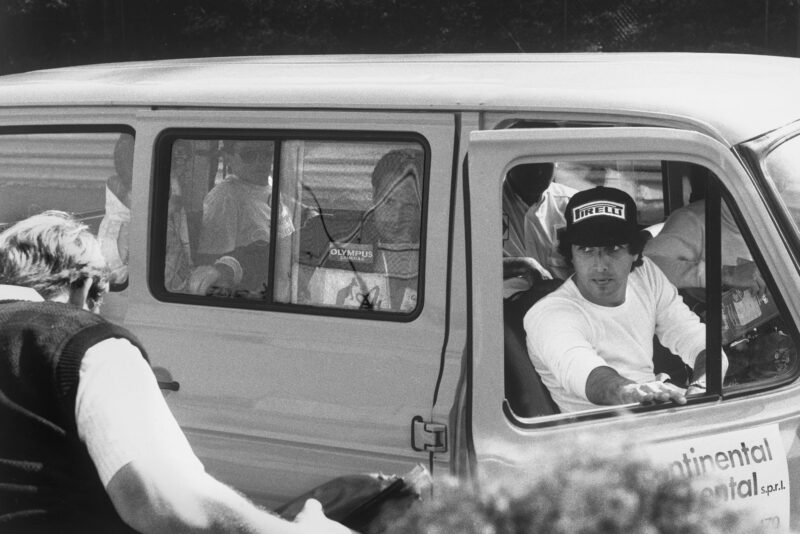 Nelson Piquet steps out of a minibus with other drivers to inspect the damage track at Spa ahead of the cancelled 1985 Belgian Grand Prix