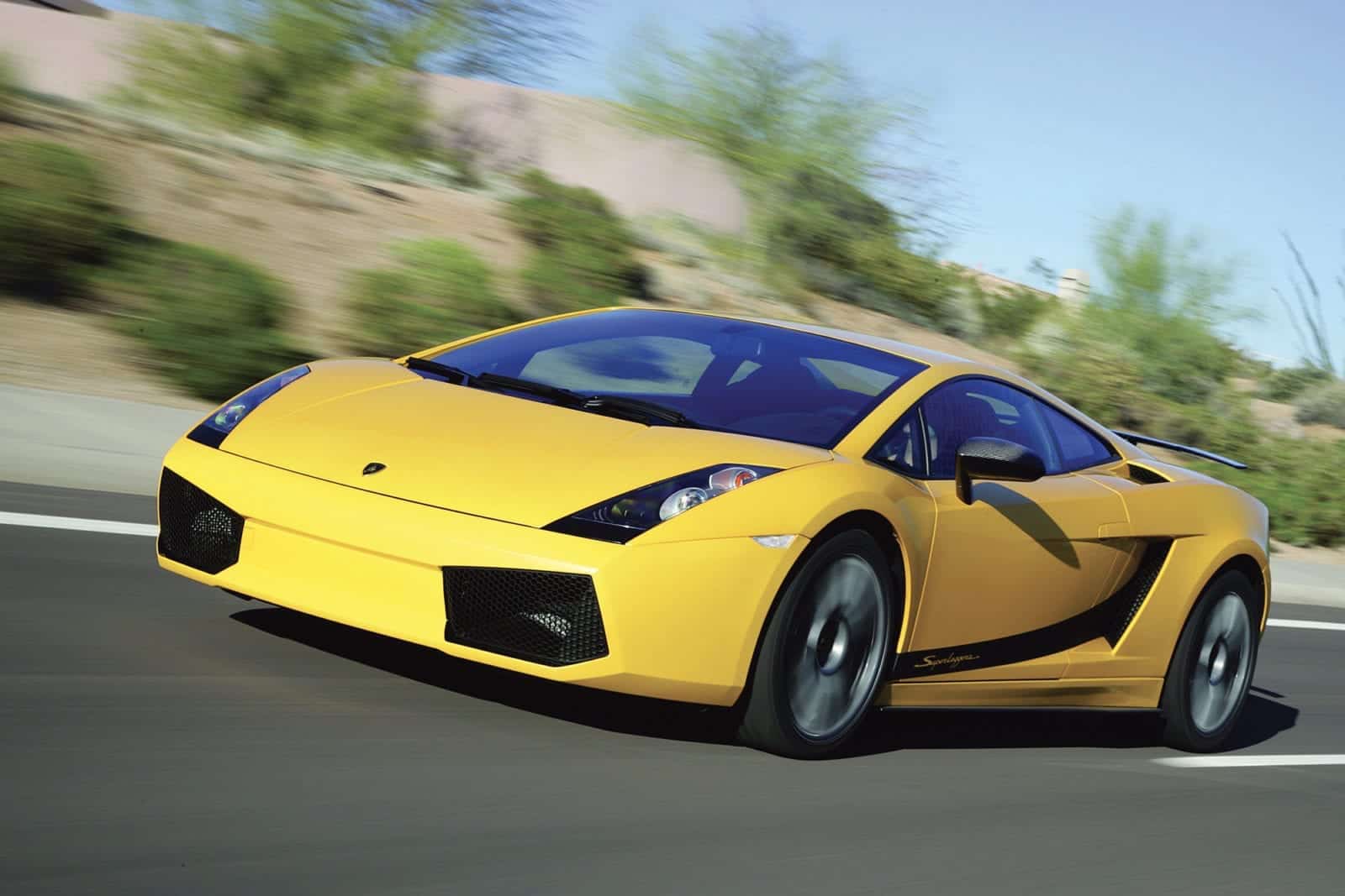 Yellow Lamborghini Gallardo on the road