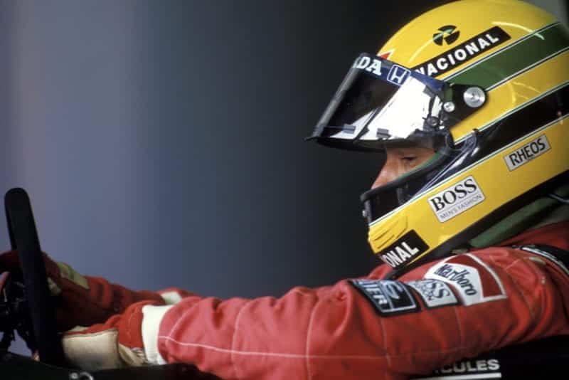 Side view of Ayrton Senna in his McLaren cockpit during the 1990 F1 season