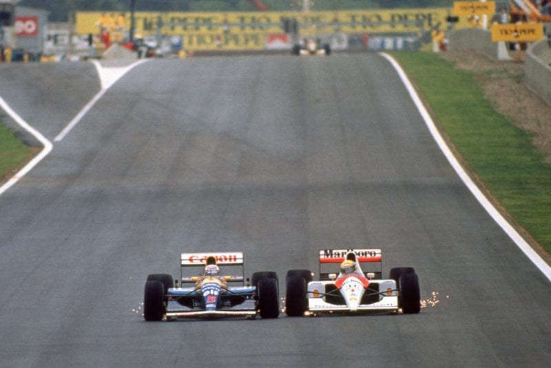 Ayrton Senna is side by side with Nigel Mansell at the 1992 Spanish Grand Prix