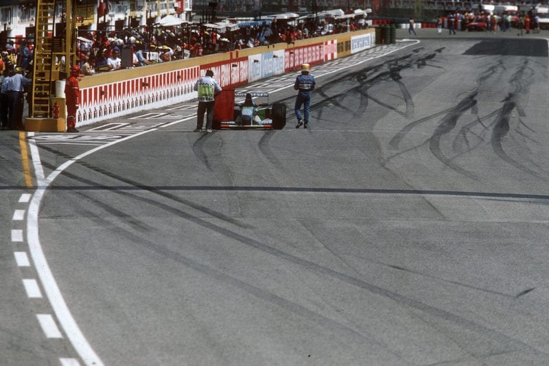 The 1994 San Marino Grand PRix is stopped after Ayrton Senna's crash