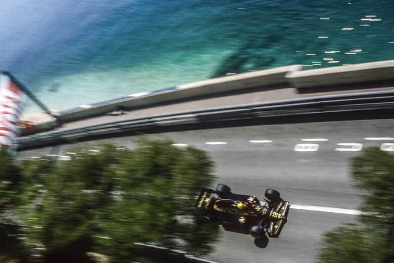 Ayrton Senna on the seafront in his Lotus during the 1985 Monaco Grand Prix