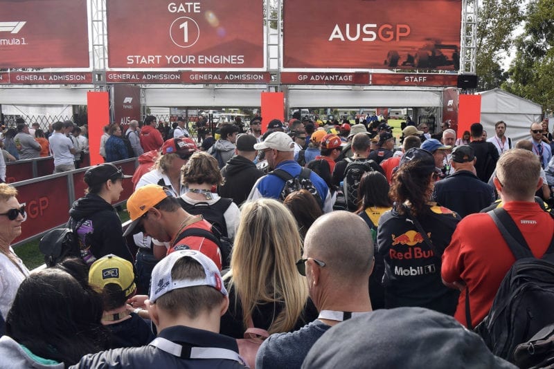 Fans queue outside Melbourne's Albert Park circuit before the 2020 Australian Grand Prix was cancelled