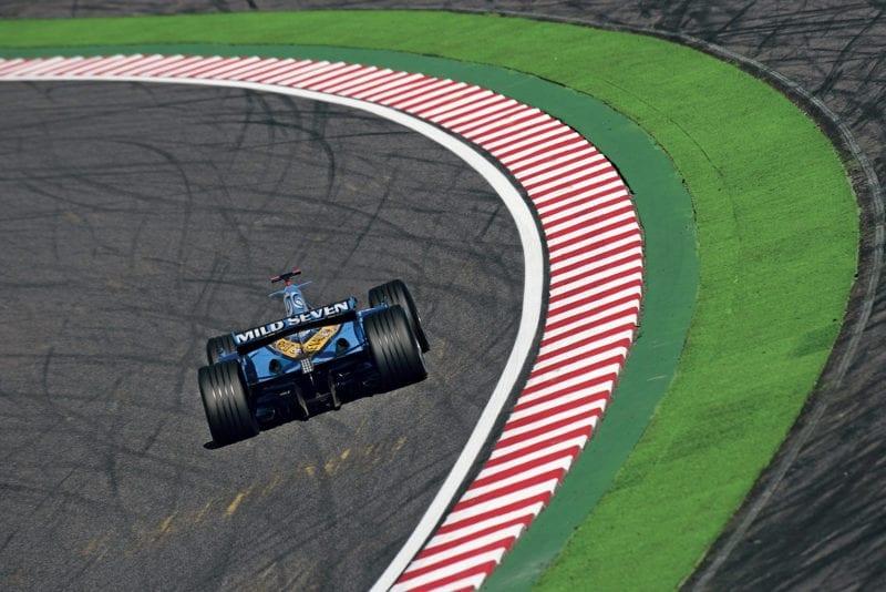 Fernando Alonso in the 130R corner at Suzuka