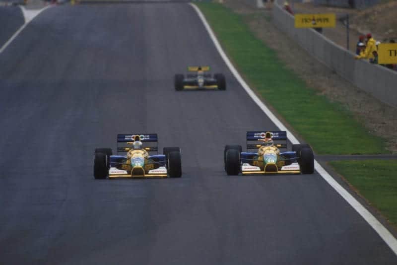 Michael Schumacher passes team mate Nelson Piquet in the 1991 Spanish Grand Prix