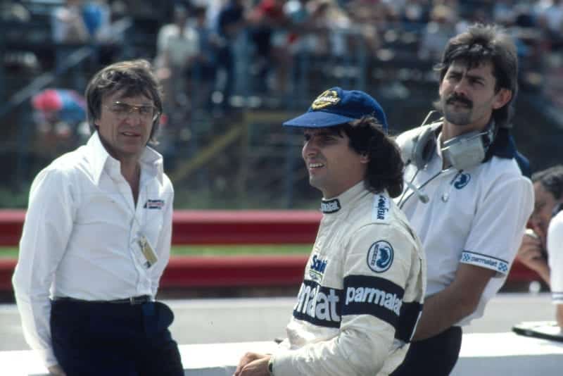 Nelson Piquet with Bernie Ecclestone and Gordon Murray in 1983