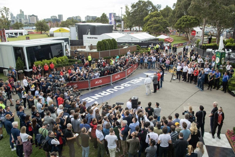 Scores of journalists listen to an F1 press conference after cancellation of the 2020 Australian Grand Prix