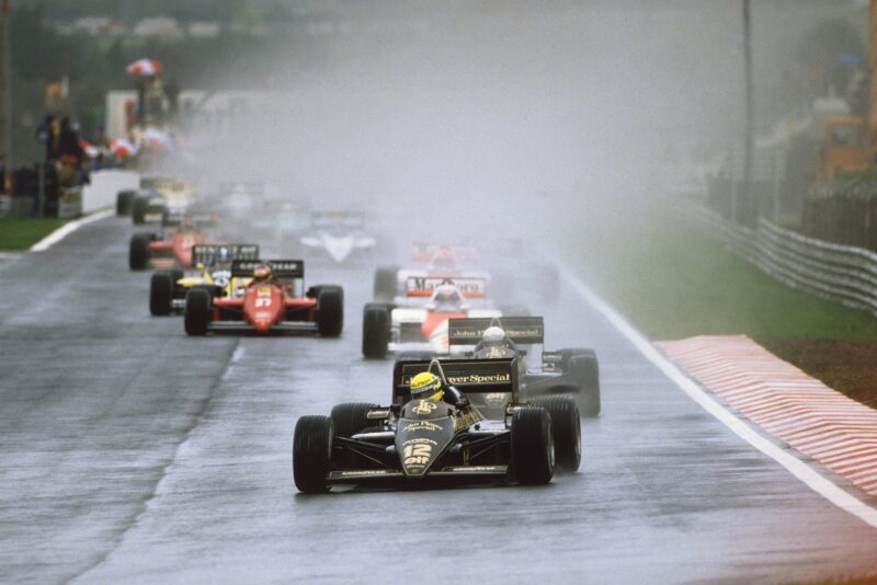 Ayrton Senna leads in the rain at the 1985 Portuguese Grand Prix at Estoril