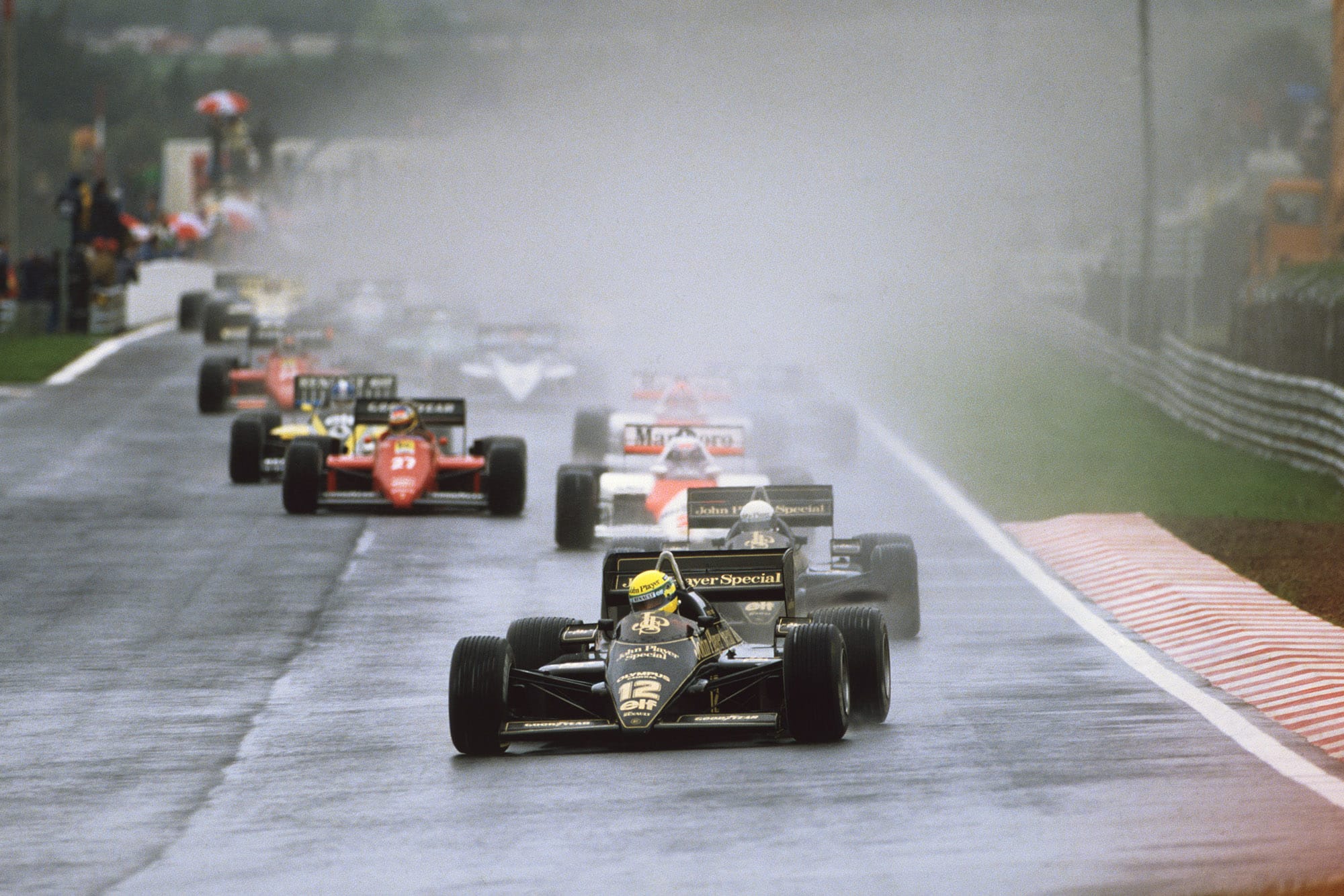 Ayrton Senna leads in the rain at the 1985 Portuguese Grand Prix at Estoril