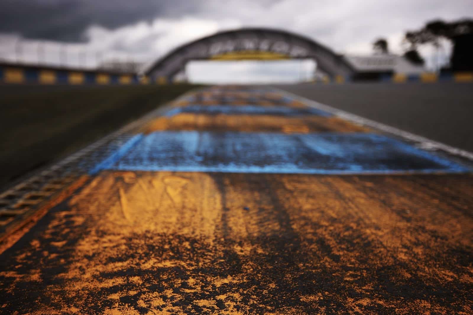 Empty Le Mans track with Dunlop Bridge in the background