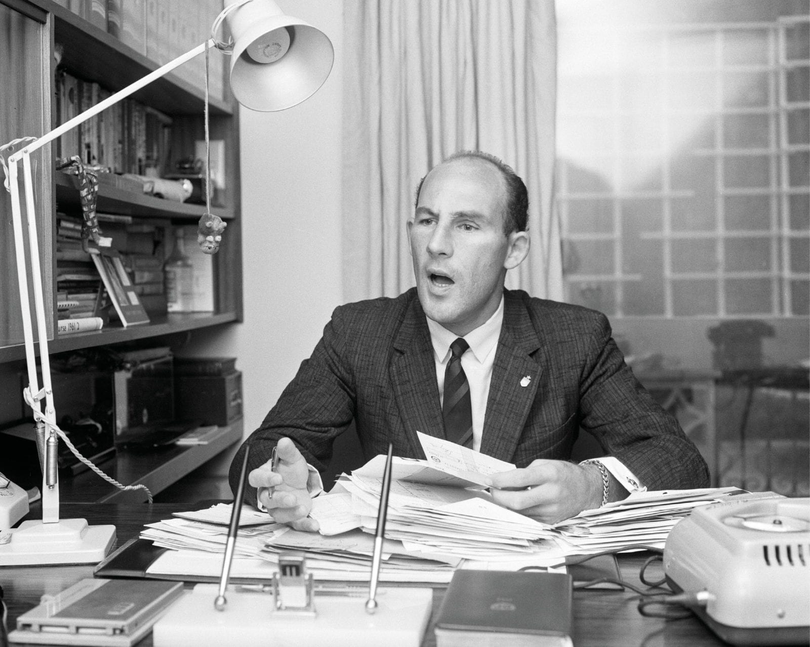 Stirling Moss in his office not long after his Goodwood crash in 1962