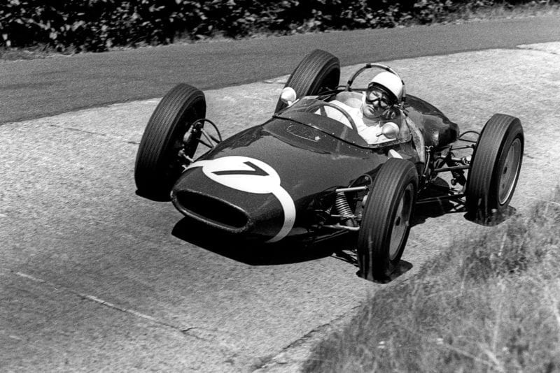 Stirling Moss in a Lotus-Climax a8 at the Nurburgring for the 1961 German Grand Prix