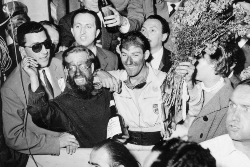 Stirling Moss and Denis JEnkinson celebrate victory in the 1955 Mille Miglia