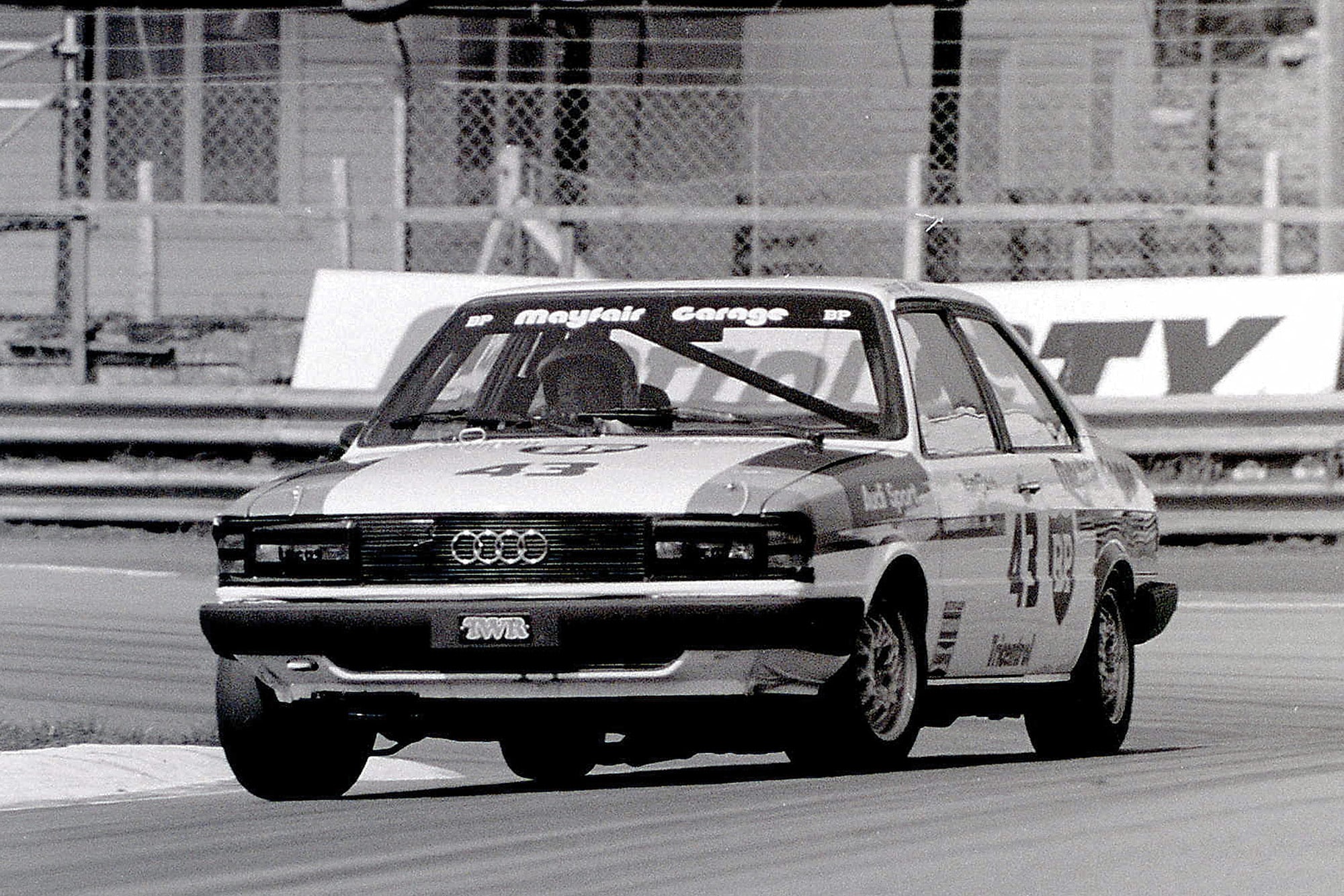 Stirling Moss in an Audi 80 at Oulton Park racing in the 1981 British Saloon Car Championship