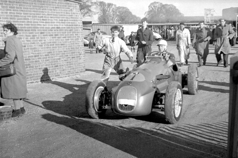 Stirling Moss in his HWM in the Goodwood paddock 1951