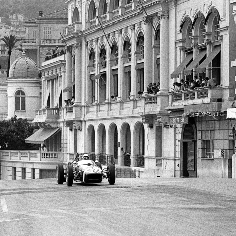 Stirling Moss up the hill at Monaco in 1961 square