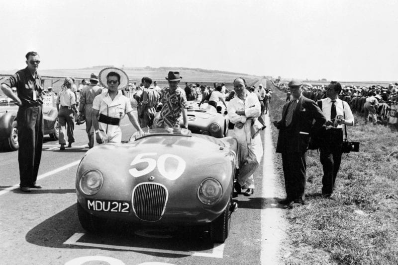 Stirling Moss with his Jaguar XK120C at the 1952 Reims Grand Prix