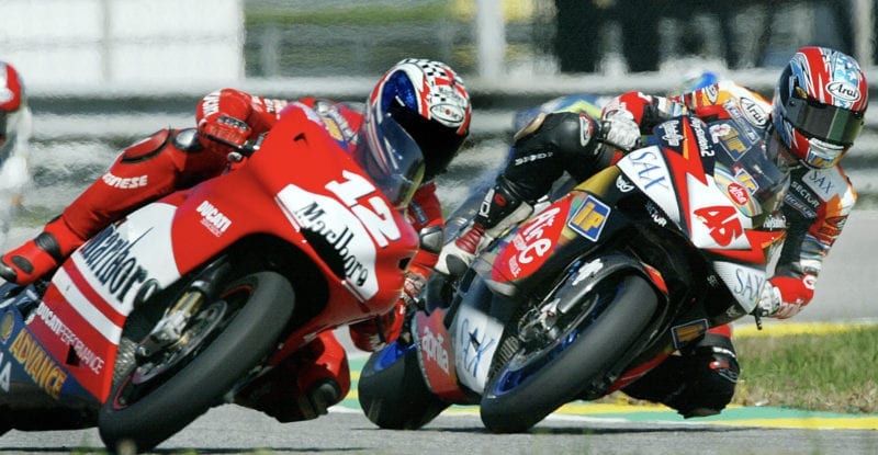 Troy Bayliss alongside Colin Edwards in practice ahead of the 2003 Rio GP