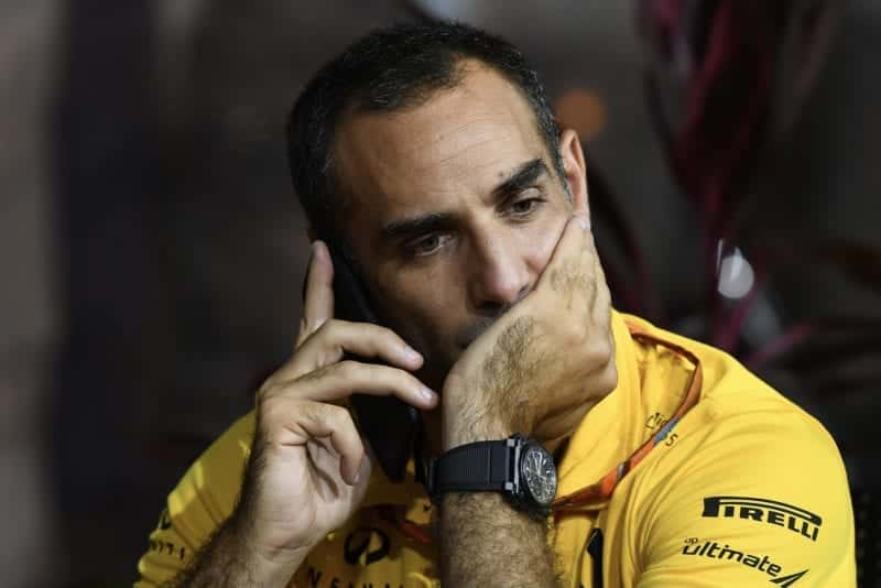 Cyril Abiteboul rests his chin on his hand
