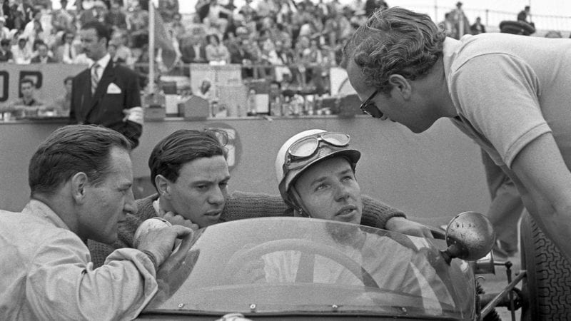 Innes Ireland Jim Clark John Surtees and Colin Chapman at the 1960 Portuguese Grand Prix