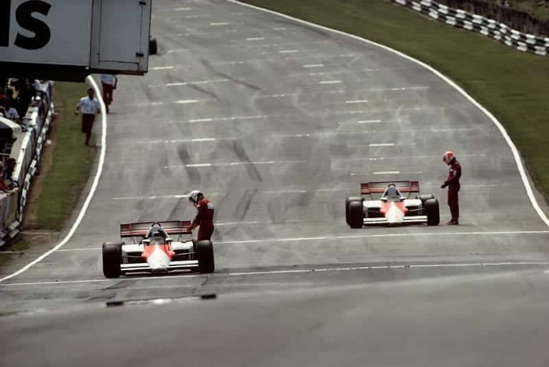 Alain Prost and Niki Lauda on the grid after a red flag stopped the 1984 British Grand Prix