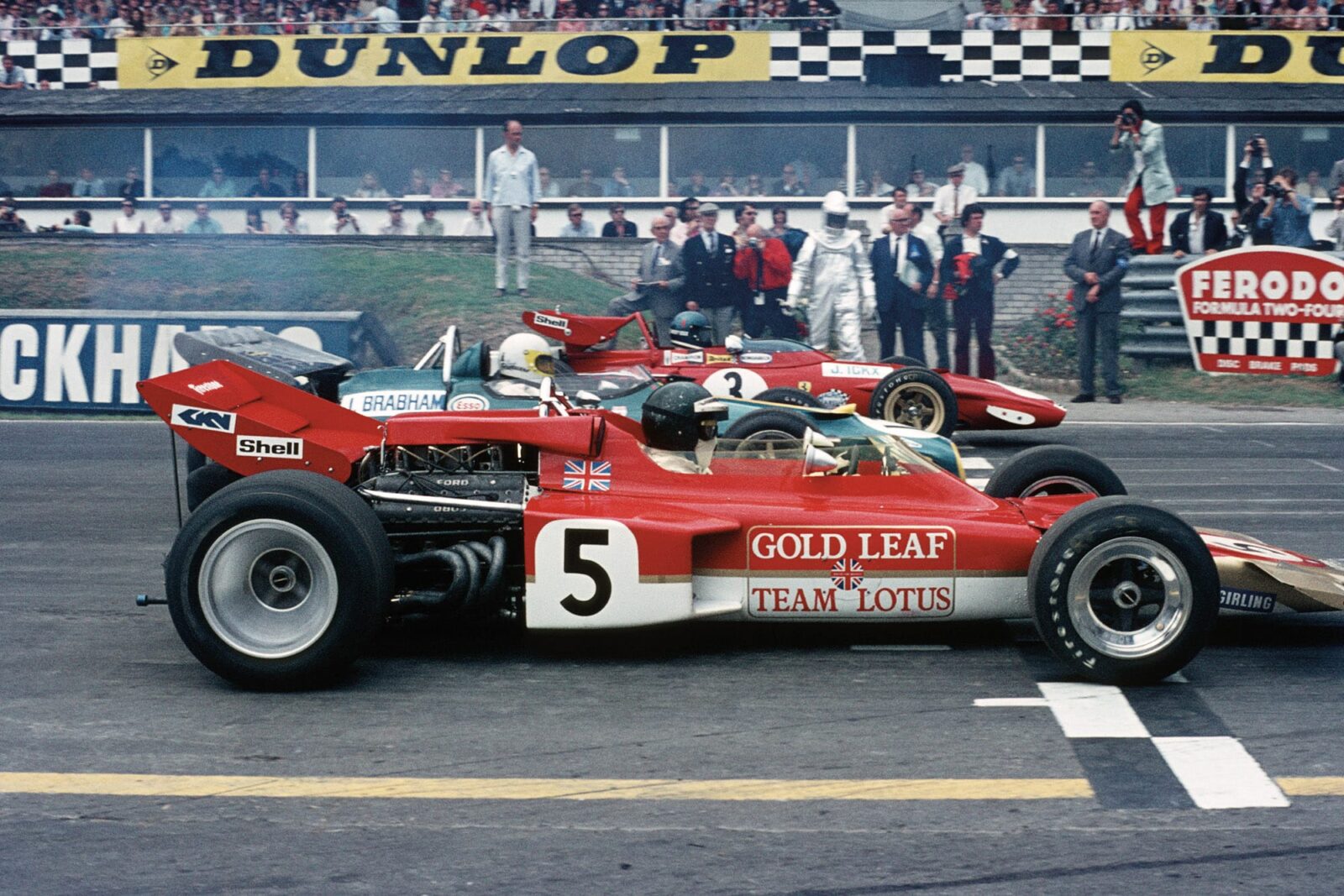 Jochen Rindt Jack Brabham and Jacky Ickx on the Brands Hatch grid at the 1970 F1 Brtish Grand Prix