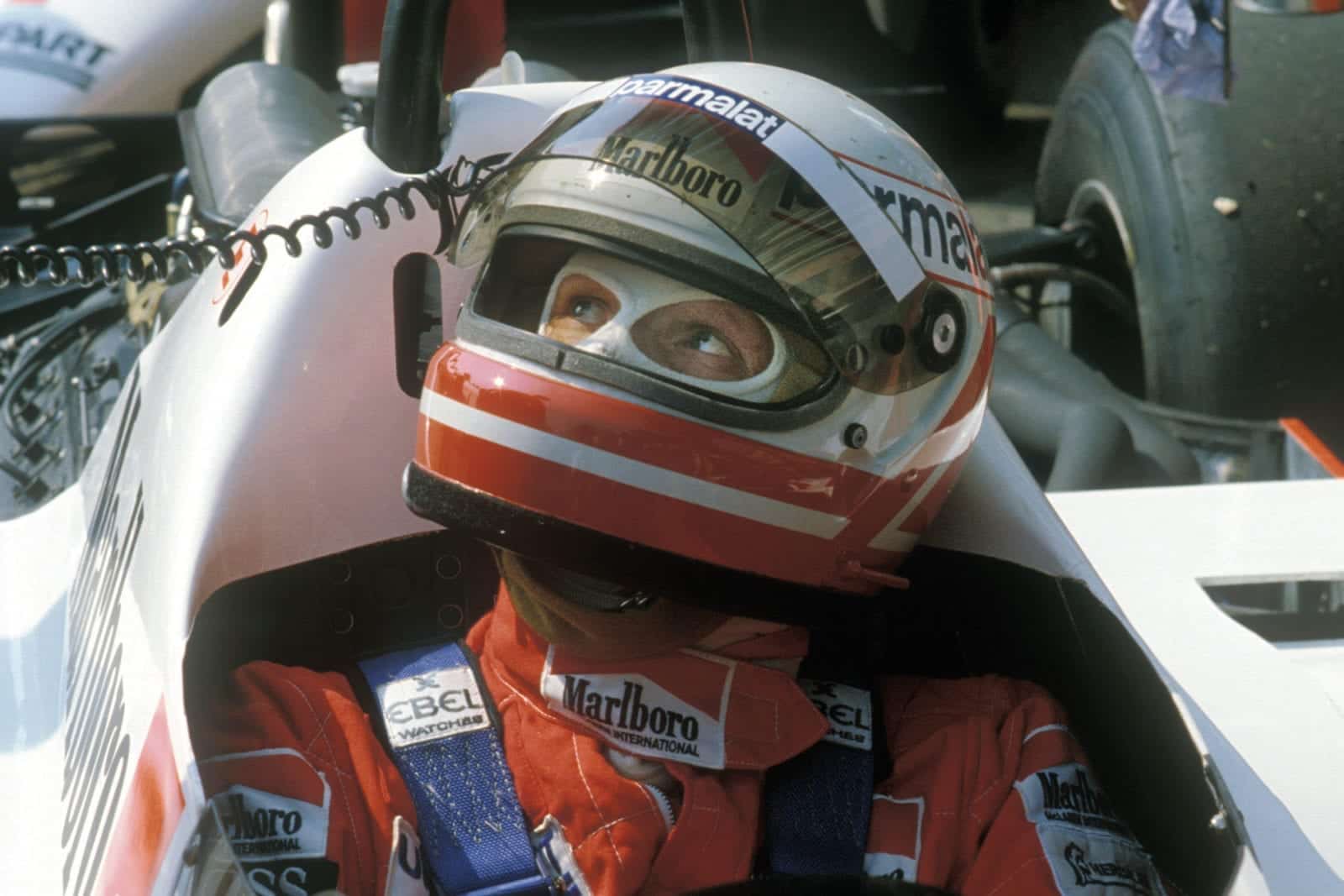 Niki Lauda in his McLaren Ford with his helmet on in 1982
