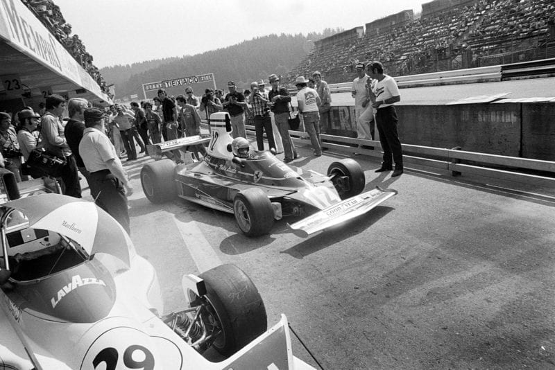 Niki Lauda pulls out of the pits in his Ferrari 312T at the 1975 Austrian Grand Prix