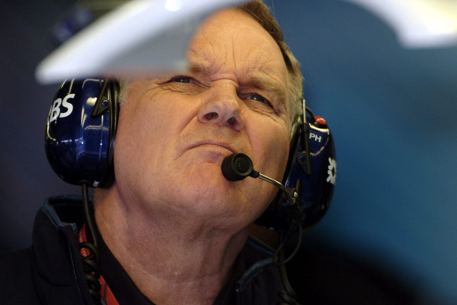 Patrick Head with headphones on at the 2006 Australian Grand Prix