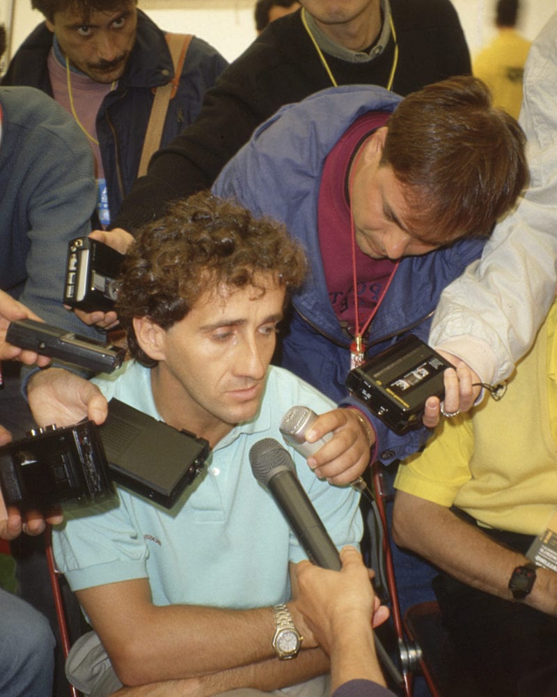 Alain Prost being interviewed.
