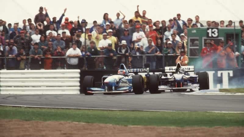 Damon Hill and Michael Schumacher collide during the 1995 F1 British Grand Prix