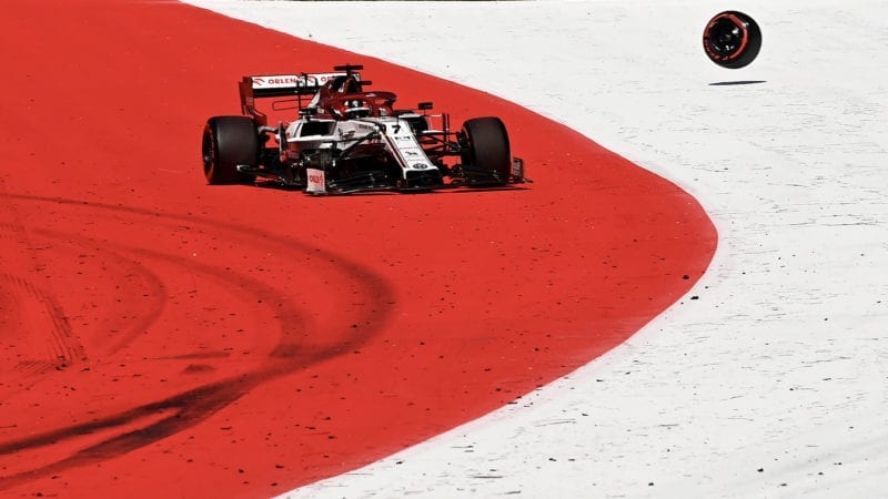 Kimi Raikkonen's Alfa Romeo loses its right front wheel at the 2020 austrian grand prix