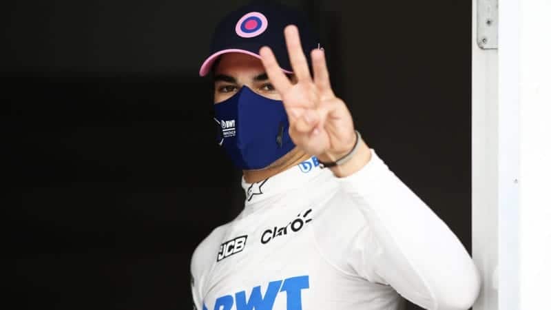 Lance Stroll holds three fingers up after qualifying third for Racing Point at the 2020 F1 Hungarian Grand Prix