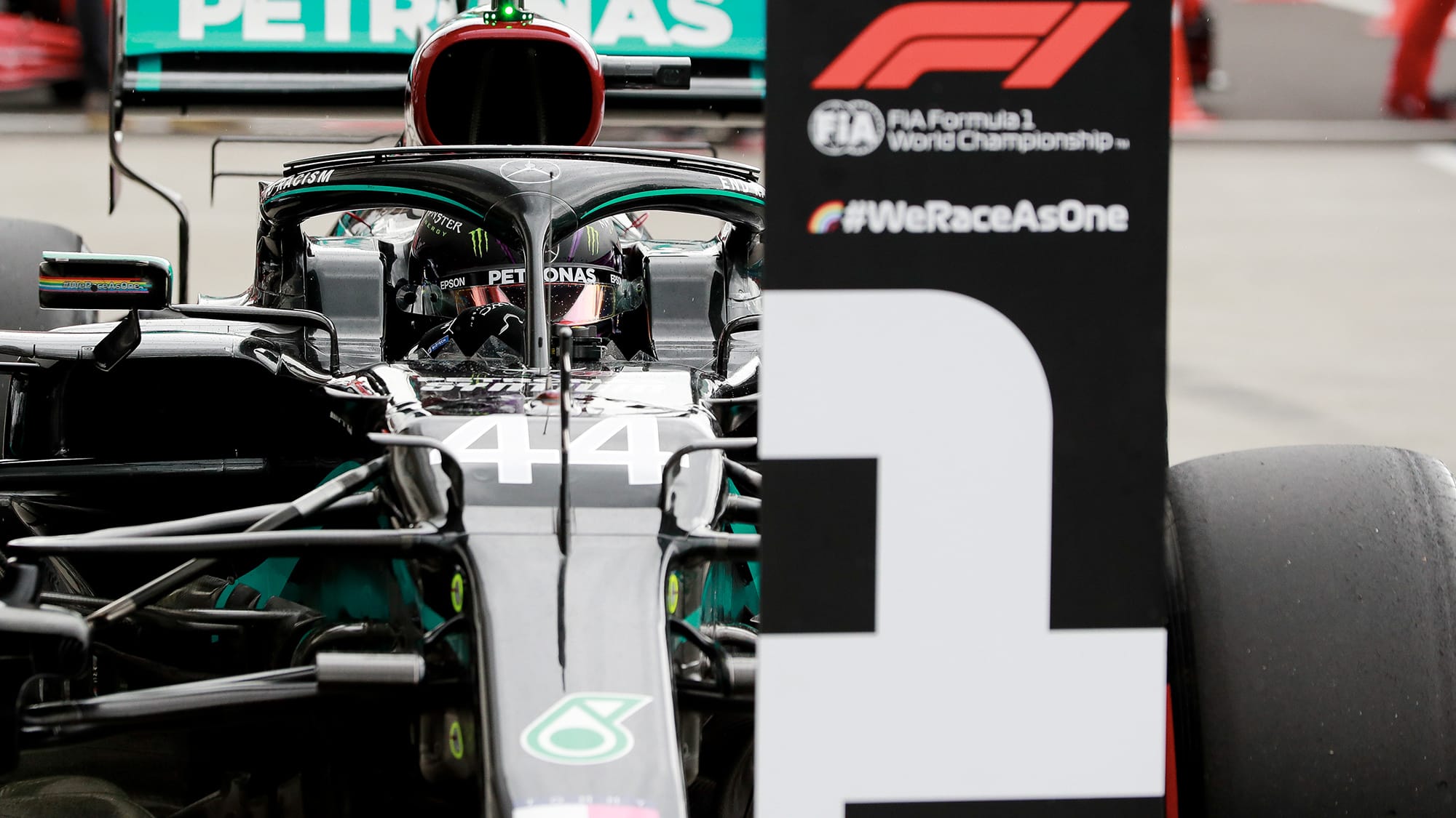 Lewis Hamilton parks his Mercedes in front of the number won board after securing pole at the 2020 F1 Hungarian Grand Prix