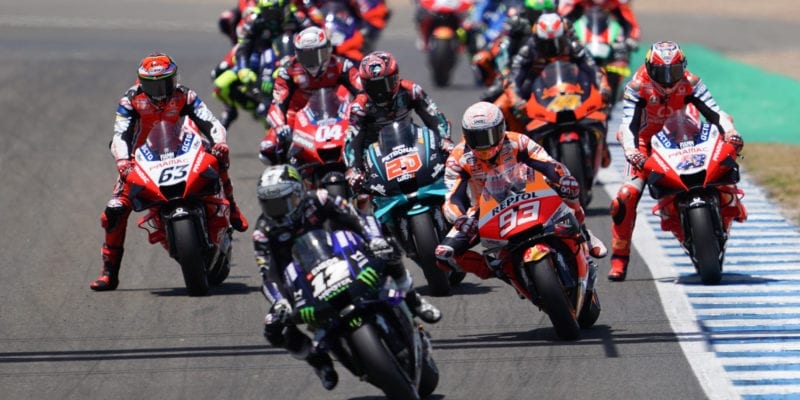 Maverick Vinales pursued by Marc Marquez at the start of the 2020 MotoGP Spanish Grand Prix