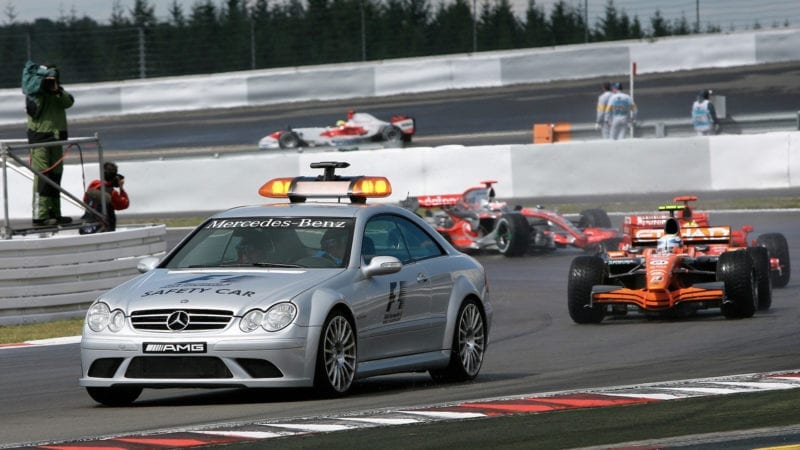Markus Winkelhock leads the field behind the safety car at the 2007 European F1 Grand Prix at the Nurburgring