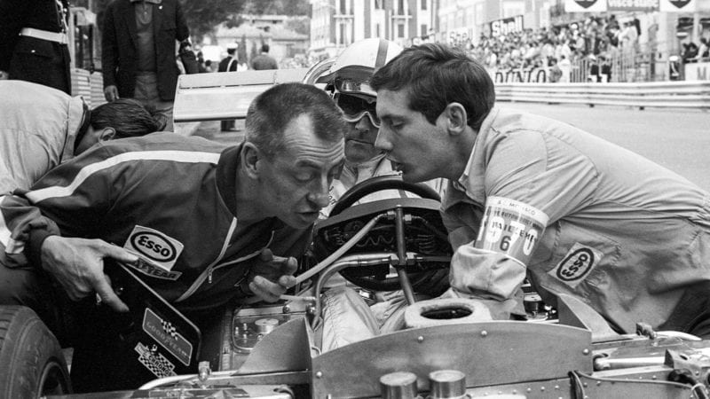 Ron Tauranac and Ron Dennis peer into the Brabham Ford BT33 of Jack Brabahm - sat in the cockpit - at the 1970 Monaco Grand Prix