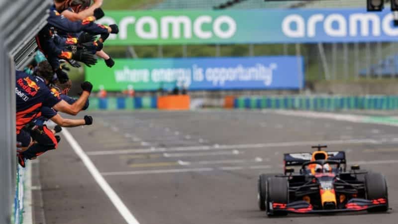 The Red Bull team cheer Max Verstappen as he crossed the line to take second place int he 2020 F1 Hungarian Grand Prix