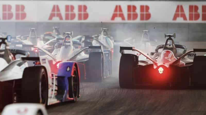 Cars jostle on the track during the final races of the Formula E 2019-20 season at Berlin Tempelhof Airport