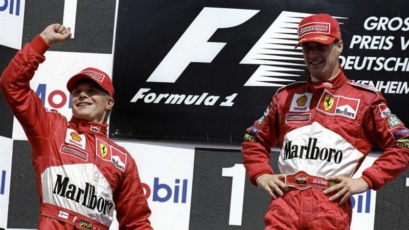 Eddie Irvine and Mika Salo on the podium after finishing 1-2 at Hockenheim in the 1999 F1 German Grand Prix