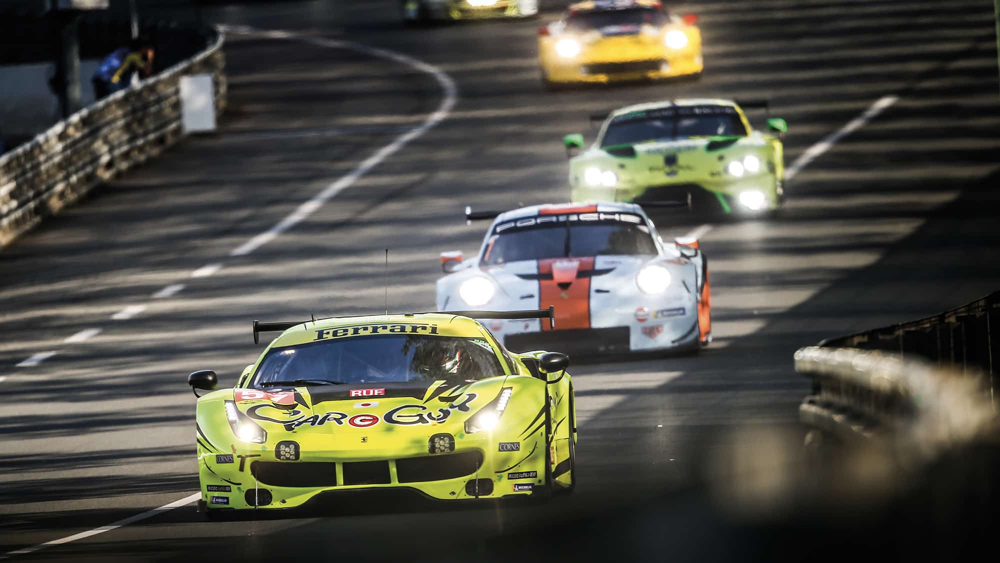 Ferrari Porsche and Aston Martin GT cars at the Le Mans 24 Hours